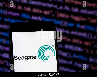 Seagate Technology company  logo seen displayed on smart phone.  Seagate Technology PLC is an American data storage company. It was incorporated in 1978, as Shugart Technology. Since 2010, the company is incorporated in Dublin, Ireland, with operational headquarters in Cupertino, California, United States. Stock Photo