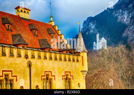 Neuschwanstein and details of Hohenschwangau Castle in Germany, Bavaria, mountains view Stock Photo