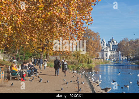 London, Westminster.   The Scene by the lake in St James's Park on a warm autumn day in November. Stock Photo