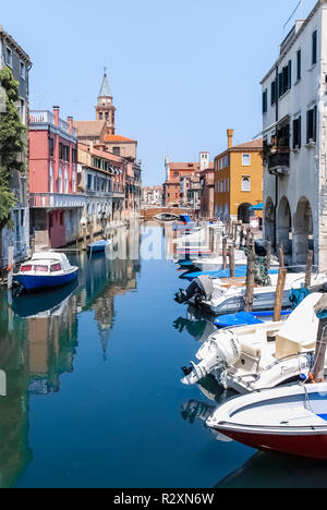 Boat on the Canal Vena in Chioggia, Italy Stock Photo