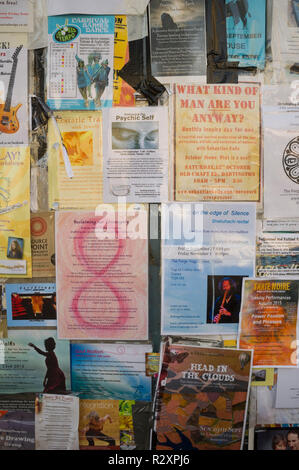 Alternative activities and new age therapies on a notice board in Totnes Devon Stock Photo