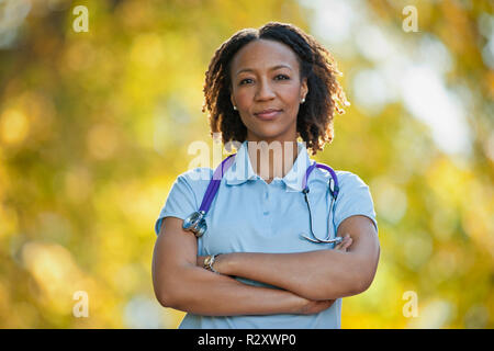 Portrait of a confident female nurse with her arms crossed. Stock Photo