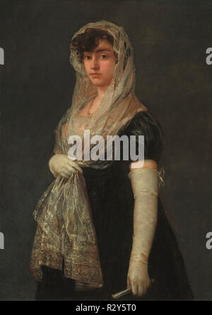 Young Lady Wearing a Mantilla and Basquina. Dated: c. 1800/1805. Dimensions: overall: 109.5 x 77.5 cm (43 1/8 x 30 1/2 in.)  framed: 125.4 x 93.6 x 6 cm (49 3/8 x 36 7/8 x 2 3/8 in.). Medium: oil on canvas. Museum: National Gallery of Art, Washington DC. Author: FRANCISCO DE GOYA. Stock Photo
