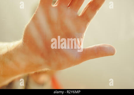 Handprint on dirty glass window abstract background Stock Photo