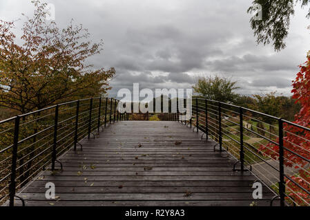 View over the colorful citypark of Stuyvenbergh from a pedestrian bridge during autumn Stock Photo