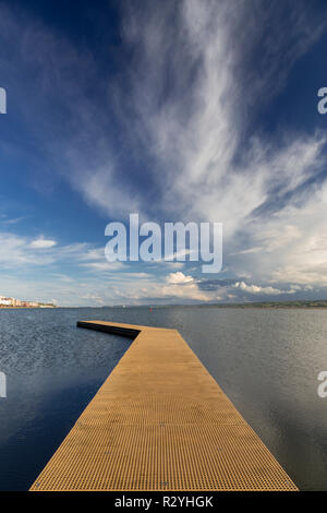 Jetty on the Marine Lake at West Kirby, with cirrus clouds, England Stock Photo