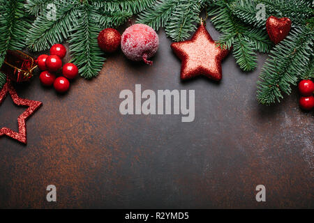 Christmas background with fir tree and decor. Top view with copy space Stock Photo