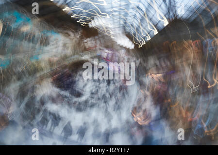 Imprssionistic view of crowded busy railway station Stock Photo