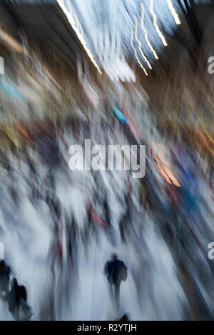 Imprssionistic view of crowded busy railway station Stock Photo