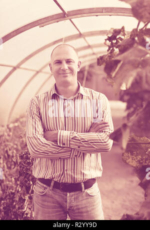 Portrait of  man in greenhouse Stock Photo