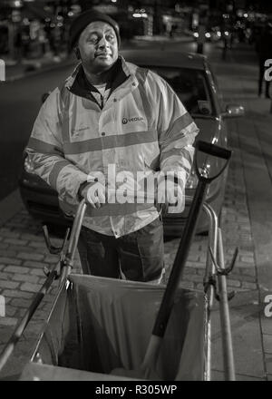 street cleaner at night, Camden High street London, Stock Photo