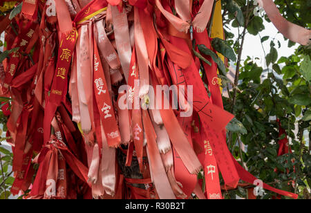 Old red ribbon with prayers by Yuhuang Pavilion in Tianjin Stock Photo