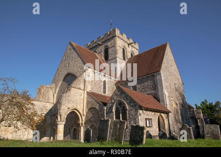 Picturesque Church of St Mary and St Blaise in the West Sussex village of Boxgrove. Illuminated by a low winters sun. Stock Photo