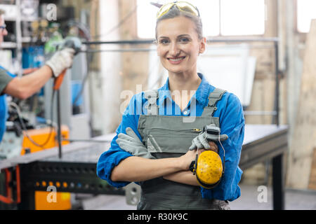 Workers in a metal workshop  Stock Photo