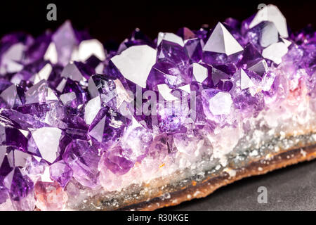 Sharp and detailed Amethyst stone detail - a violet variety of a quartz Stock Photo