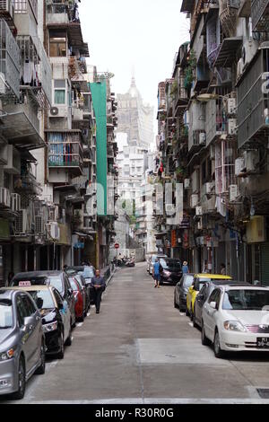 Street in Macau with Grand Lisboa building in the background. Stock Photo