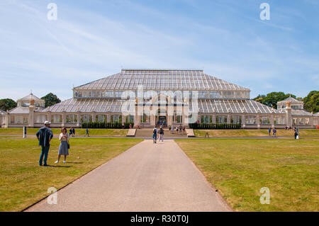 LONDON - JUN 24: View of the Temperate House from the Kew Gardens on June 24, 2018 in London, United Kingdom. Stock Photo