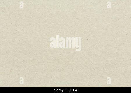Recycled paper or cardboard background with coloured flecks and fibre texture Stock Photo