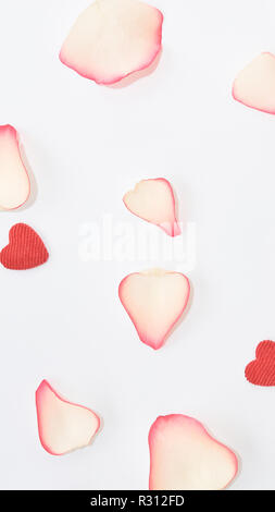 Gift and roses composition on the white background. Top view, flat lay. Birthday, Mother's, Valentines, Women's, Wedding Day concept. Stock Photo
