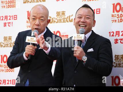 Tokyo, Japan. 21st Nov, 2018. Japanese comedy duo Viking members Eiji Kotoge (L) and Mizuki Nishimura attend a promotional event for the 1 billion yen 'Year-end Jumbo lottery' as the first tickets go on sale in Tokyo on Wednesday, November 21, 2018. Thousands punters queued up for tickets in the hope of becoming a billionaire. Credit: Yoshio Tsunoda/AFLO/Alamy Live News Stock Photo