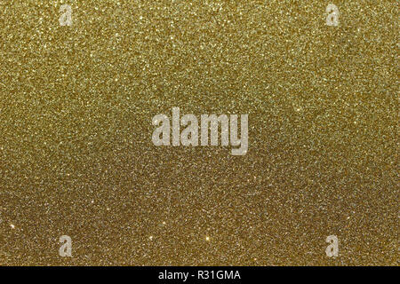 Sparkling gold glitter macro abstract background Stock Photo