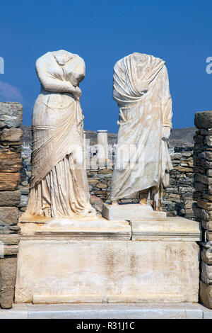 Statues, house of Cleopatra, archaeological site on museum island Delos, Cyclades, island Delos, Greece Stock Photo