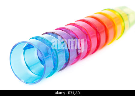 Colorful plastic glasses isolated on white background. Stock Photo