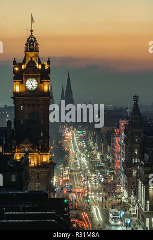 Edinburgh, Scotland. 11/18/18. View of Princess Street from Calton Hill at dusk, with lights on and beautiful color in the sky. Long exposure Stock Photo