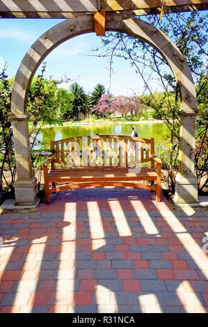 Brick arbor in garden Stock Photo - Alamy
