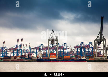 Industrial port cargo logistics containers and ship cranes in Hamburg Stock Photo