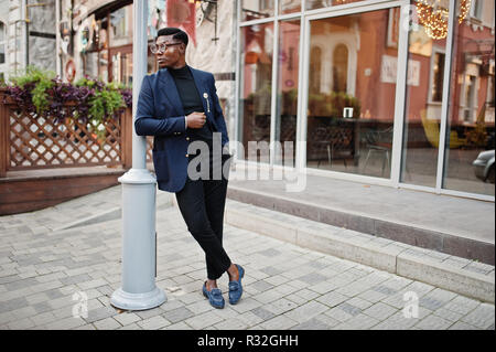 Premium Photo | Two fashion black men pose against house with garlands  fashionable portrait of african american male models wear suit coat and hat