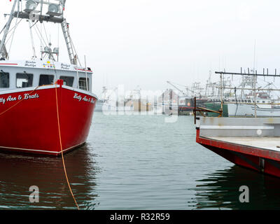 Lobster boats sit in a protected cove at Cape Forchu, Nova Scotia, Canada. Stock Photo