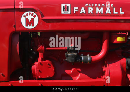 Tractor- 1951 International Harvester McCormick Farmall model Super M logo and engine. Canfield Fair. Mahoning County Fair. Canfield, Youngstown, Ohio Stock Photo