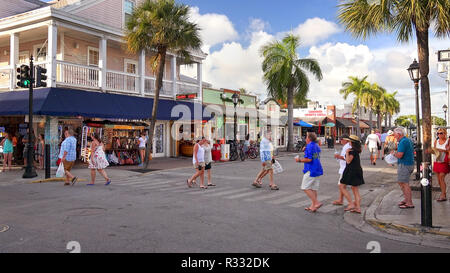 KEY WEST, FLORIDA - JUNE 4th: Tourists explore shops along Duval Street in downtown Key West, Florida on June 4th, 2016. Stock Photo