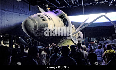 CAPE CANAVERAL, FLORIDA - JUNE 14th: A crowd of visitors view the space shuttle Atlantis at the Kennedy Space Center in Cape Canaveral, Florida on Jun