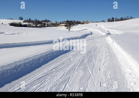 winter sports in bavaria - skating and cross-country skiing Stock Photo