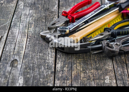 Set of tools. Hand tools for craftsmen on wooden table. Stock Photo