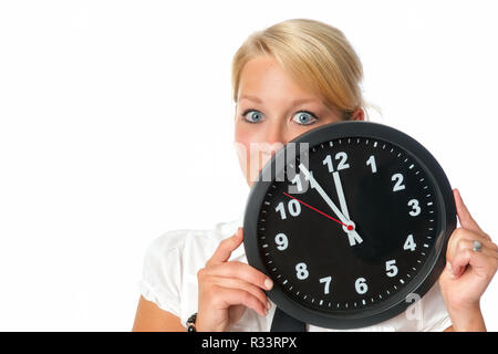 woman is holding a wall clock Stock Photo
