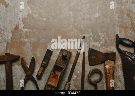 Top view of different carpentry tools on old background Stock Photo