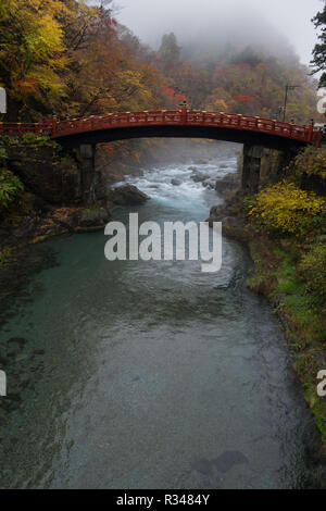 Looking at the beautiful Shinkyo bridge in Nikko, Japan on a misty ...