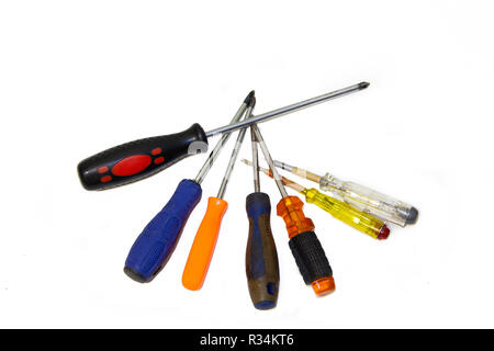 screwdriver on a white background. A set of tools for collecting furniture. Male tool kit. Stock Photo