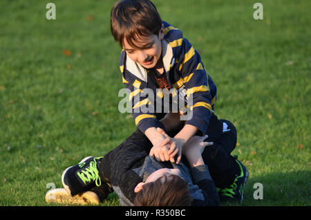 Pre teen young boys fighting Stock Photo