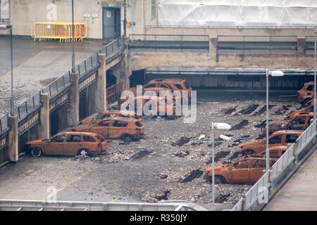 A view of burnt out vehicles on the multi-storey Liverpool Waterfront Car Park near to the Echo Arena which was destroyed by fire on New Year's Eve 2017. Work starts on Wednesday to remove almost 1200 cars which were caught in the blaze and to demolish the seven-storey car park. Stock Photo