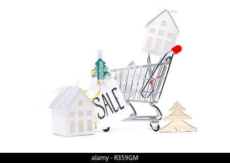 Image of iron cart, Christmas tree, card with inscription Stock Photo