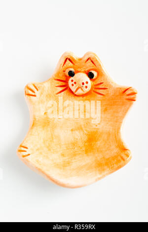 ESKISEHIR, TURKEY - DEC 1, 2016: Cute colorful ceramic cat shape ashtray on white background Stock Photo