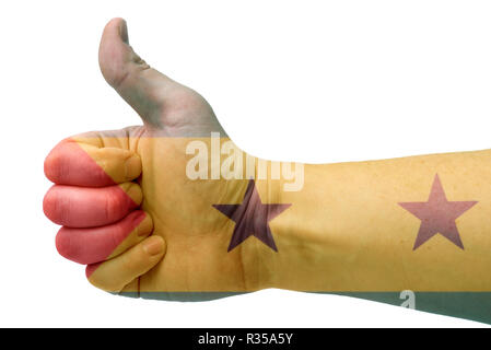 The concept of Sao Tome and Principe-hand raises your thumb up with the flag of Sao Tome and Principe. Hand and flag of Sao Tome and Principe. Stock Photo