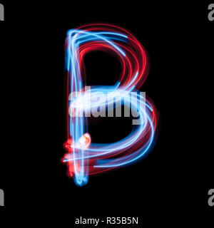 Letter B of the alphabet made from neon sign. The blue light image, long exposure with colored fairy lights, against a black background Stock Photo