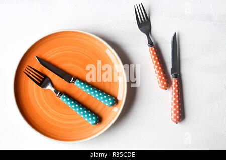 empty clean plate, fork and kinife Stock Photo