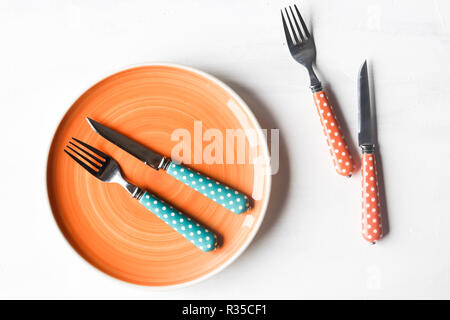 empty clean plate, fork and kinife Stock Photo