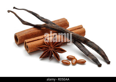 Vanilla pods, cinnamon and star anise isolated on white background Stock Photo